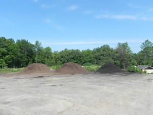 Mulch piles ready for pick up or delivery